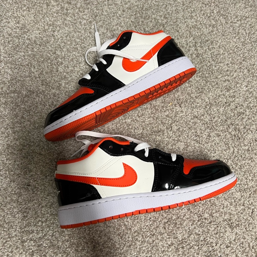 Orange and black Nike Air Force dunks 6 Y